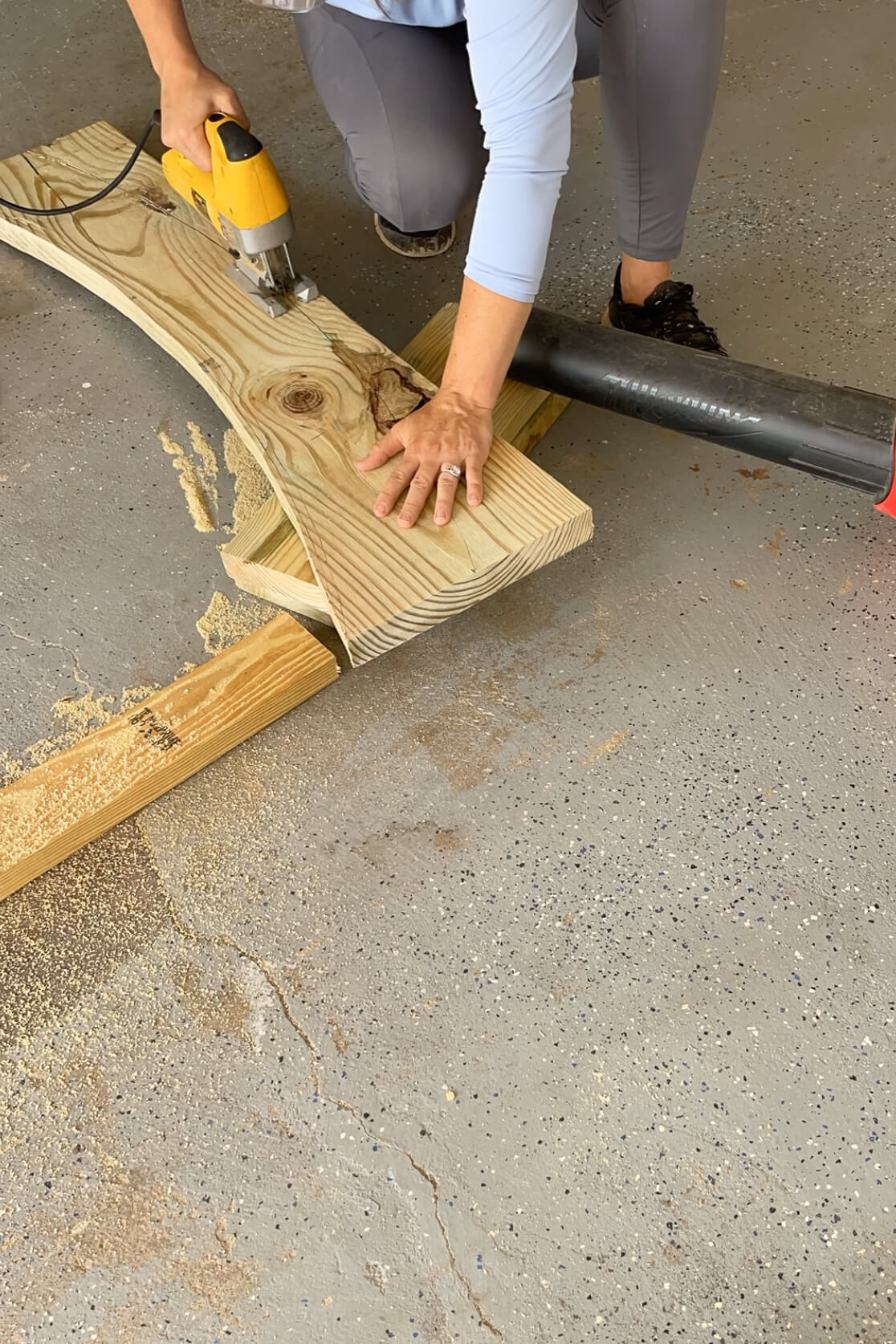 Using a jig saw to cut out an arch. 